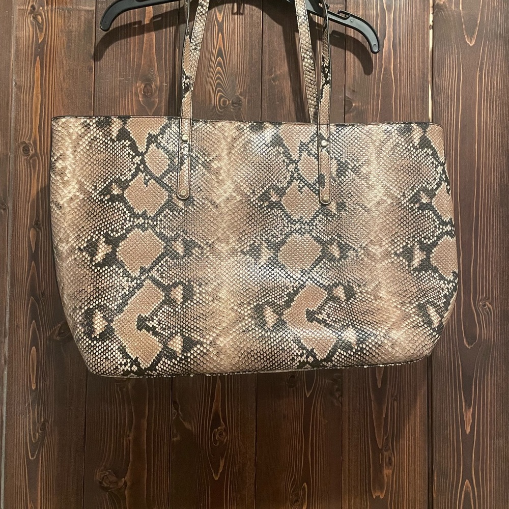 New without tags large brown faux snake print tote.